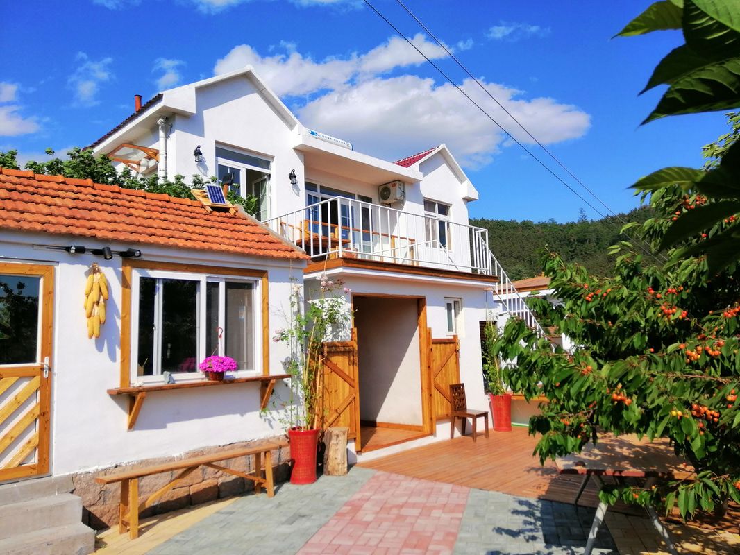 櫻花裏客棧(青島南北嶺村店)