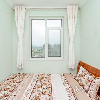 青岛西海岸一生平安公寓(两河村分店)酒店提供图片