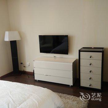 成都有免费车库和净水设备的漂亮大床房公寓(波罗村分店)酒店提供图片