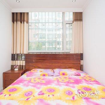 青岛金沙滩啤酒城三室一厅家庭套房公寓酒店提供图片