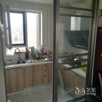 青岛蓝色的天公寓(西大村分店)酒店提供图片