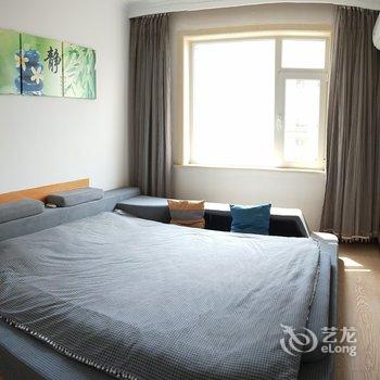 营口鲅鱼圈中房快乐之旅公寓(平安西街分店)酒店提供图片