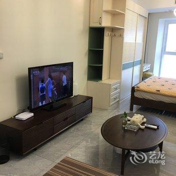 青岛愿重要的人快乐公寓酒店提供图片