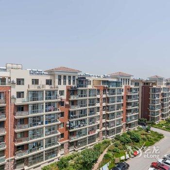 青岛看海听浪休闲旅游度假公寓(银沙滩路分店)酒店提供图片