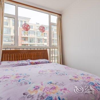 青岛看海听浪休闲旅游度假公寓(银沙滩路分店)酒店提供图片