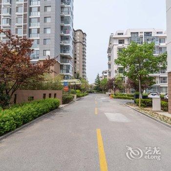 青岛金沙滩啤酒城民宿(个人房东)(黄岛区政府会议中心分店)酒店提供图片