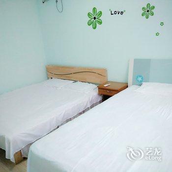 青岛金沙滩精装套三民宿酒店提供图片