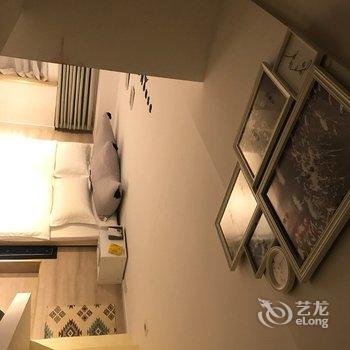 重庆谯公寓(新立村分店)酒店提供图片