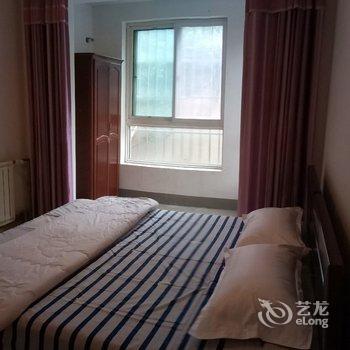 青岛临四方长途站套三厅家庭度假房公寓酒店提供图片