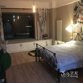 青岛会游泳的大熊猫公寓酒店提供图片