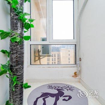 青岛旅行达人的糖果屋公寓酒店提供图片