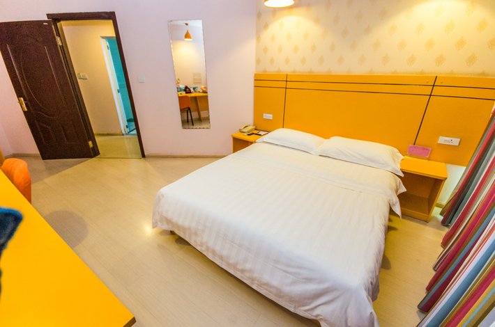 美客美家酒店(乐山春华路店)