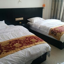 新平明太酒店