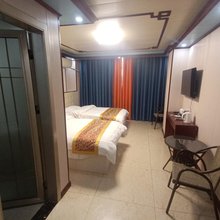 梁山怡馨主题公寓