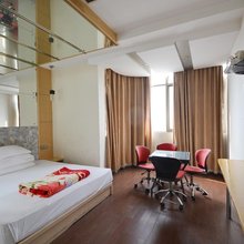 仪征7+1时尚假日旅店