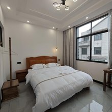 漫花楹拾光客栈
