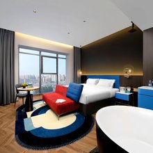 布尔曼设计师酒店(群力新区河山街地铁站店)