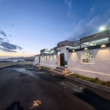 荣成潮生阁海景民宿(西霞口动物园成山头风景区店)