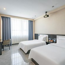亿嘉欣商务酒店(西山农场客运站店)