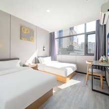 布丁严选酒店(杭州黄龙体育中心文三路地铁站店)