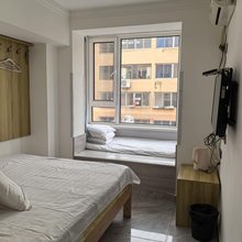 圣源丰旅店(鲅鱼圈世纪广场店)