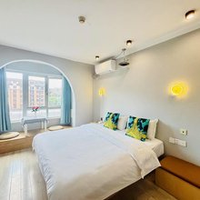 也盐设计师民宿(大学城尖顶坡地铁站店)