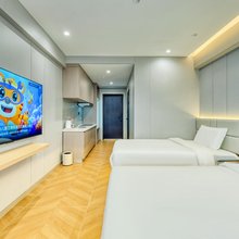 暖屿民宿(江北大学城奥莱店)