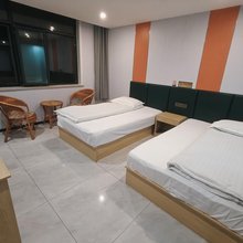 贵安商务宾馆(嘉祥一中萌山校区唐宁街店)