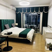 暖阁湖畔公寓(万达广场店)