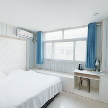 窝牛漫居酒店(潍坊泰华城店)