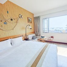 北海红风车假日酒店(侨港风情街侨港海滩店)