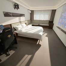 悠然智能电竞公寓(哈尔滨西站西城红场店)