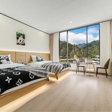 月亮巡山主题酒店(卧龙中华大熊猫苑神树坪基地店)