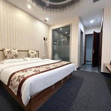 大连家主题酒店(开发区地铁站万达广场店)
