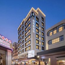 萌青春酒店(昆明火车站双桥夜市店)