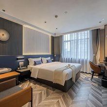 南昌M·H设计师影院酒店公寓(红谷滩万达广场店)