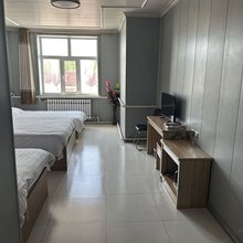 满归镇萨玛假日酒店