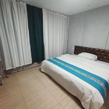 怡人宾馆(春申路店)