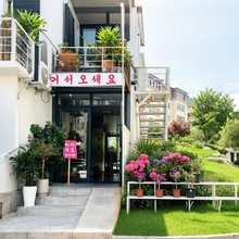 延吉弘杉酒店(延边大学网红墙店)