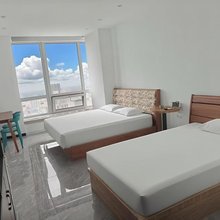 长春光之羽公寓(钜城华亿购物广场店)