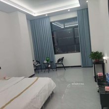 蓝朵旅馆(万家福生活超市三山国王古庙店)