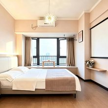 拾木轻奢影院自助公寓(东郊记忆店)