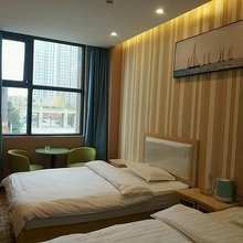 暖暖时尚宾馆(新郑华南城店)