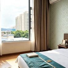 大理晴鑫酒店(洱海月湿地公园爱情海购物公园店)