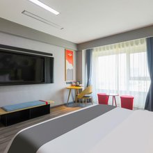 石榴酒店(哈尔滨西站高铁站万达广场店)