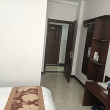 墨江通关鑫日酒店