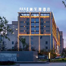 桃花源酒店(博乐市高铁站友好时尚购物中心店)