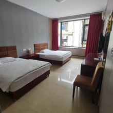 新津新一家宾馆(儒林路地铁站店)