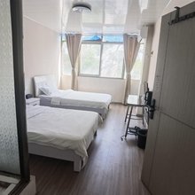 乐祺宾馆(信阳站天润广场店)