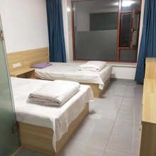 温馨时尚旅馆(体育运动中心店)